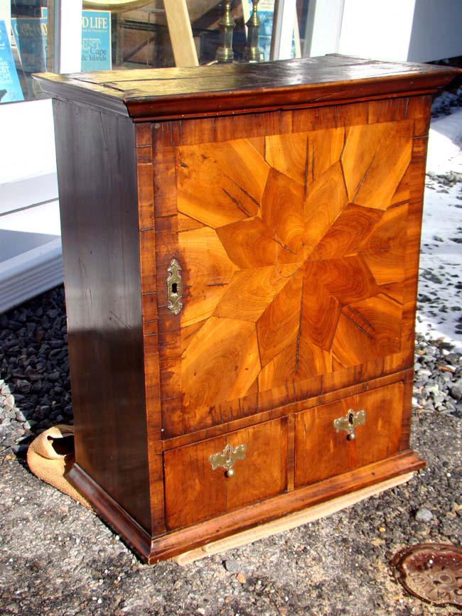 A fabulous English Queen Anne Period plumwood spice cabinet with inscription circa 1710